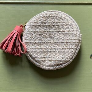 Anthropologie round wallet with leather tassel